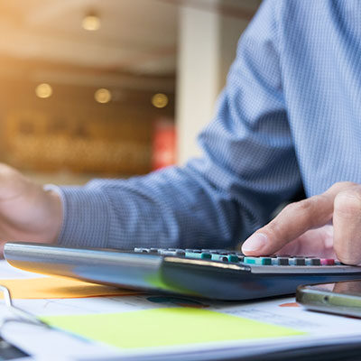 Business finance man calculating budget numbers, invoices and financial adviser work