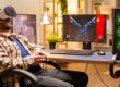 Professional gamer man using vr headset to play on powerful pc late at night