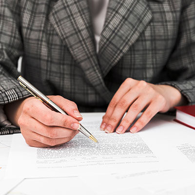 Business woman working in a office desktop