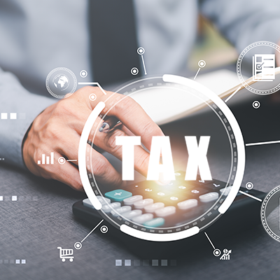 Businessman is handling paperwork and calculating tax rates and business finance budget ,